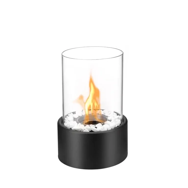 Black cylindrical tabletop ethanol fireplace with glass wind guard