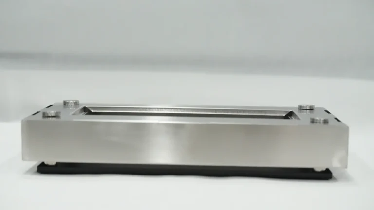 Front view of a stainless steel tabletop ethanol fireplace base and burner
