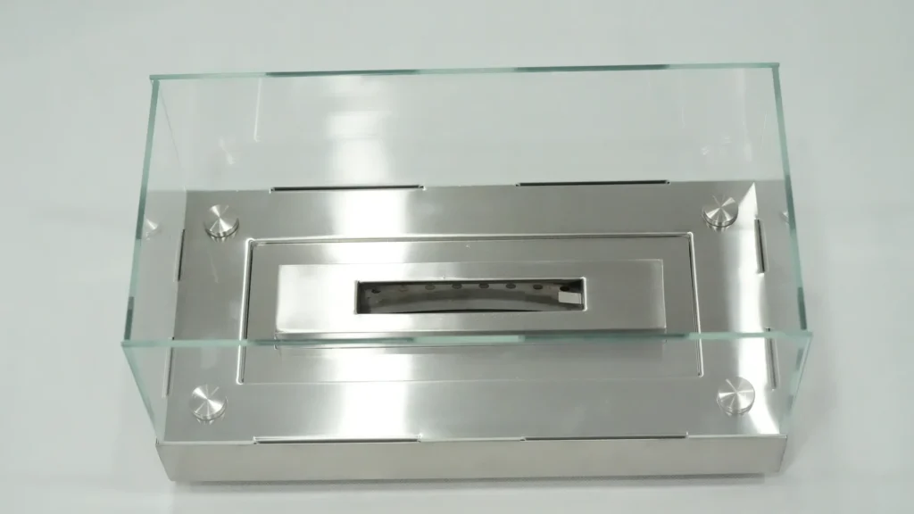 Top view of a rectangular ethanol burner and surrounding glass guard